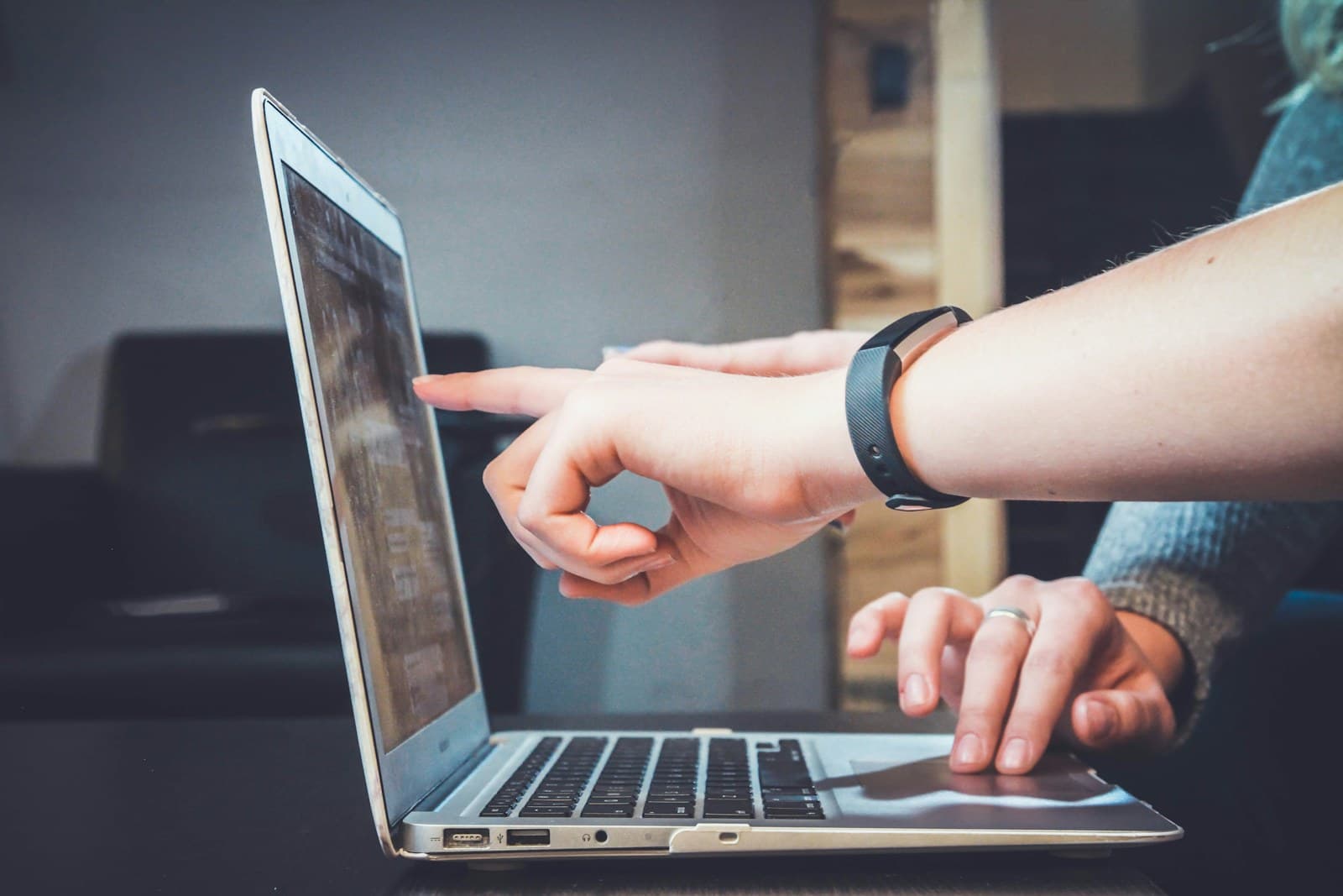 A person reviewing AI product options on a laptop